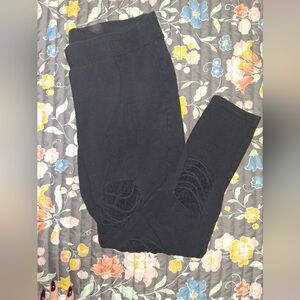 Alt Style Black Leggings with Fishnet Accents And Distressing